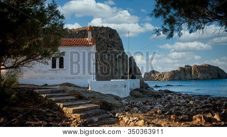 Stairs Leading Up To A Small Greek Orthodox Church On A Stormy Day At Skala Eressos On The Island Of