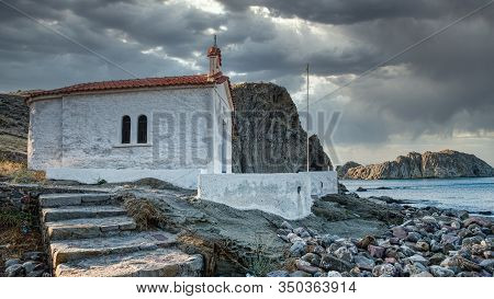 Stairs Leading Up To A Small Greek Orthodox Church On A Stormy Day At Skala Eressos On The Island Of