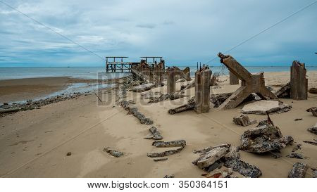 Dilapidated Old Fishing Dock Collapsing Into The Sea In Pak Nam Pran On The Gulf Of Thailand In Thai