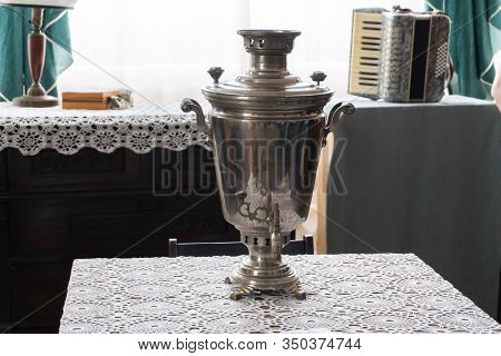 Sukhoy Log, Russia - June 26, 2019: Vintage Metal Copper Tea Samovar.