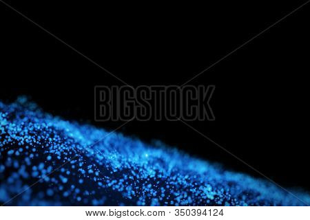 Glow Blue Particles On Black Background