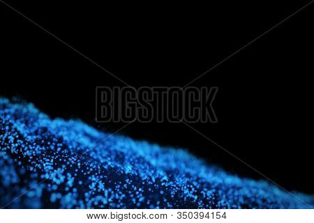 Glow Blue Particles On Black Background