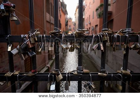 Bologna, Italy, 31 January 31 2020 Padlocks Hanging On The Gate On The Moline Canal In Via Oberdan, 