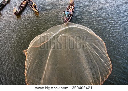 Mandalay, Myanmar - Nov 12, 2019: Fishermen Near U Bein Bridge In Amarapura,mandalay Myanmar