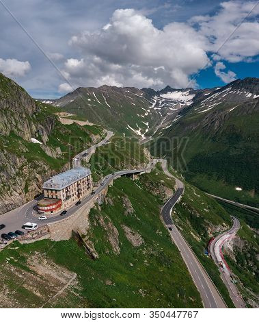 Furka Pass, Switzerland - July 21, 2019 : Aerial View Of The Closed Mountain Hotel Belvedere Located