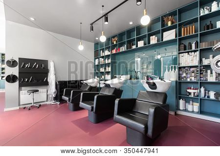 Bright Interior Of A Beauty Salon With Armchairs For Hairdresser Procedures, Professional Care Cosme