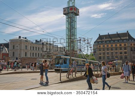 People Enjoying Summer Day At Plaza In Front Of Central Station In Oslo, Norway