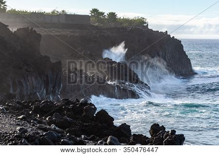 Dangerious Ocean Stormy Waves Hits Black Lava Rocks On La Palma Island, Canary, Spain