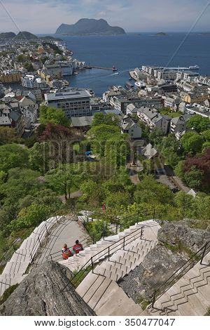 People Climbing The Stairs To Fjellstua In Alesund In Norway