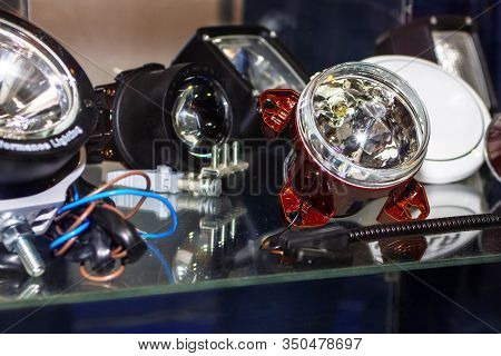 Spare Parts Car Headlamp. Auto Part Of Car At Dealership Salon.