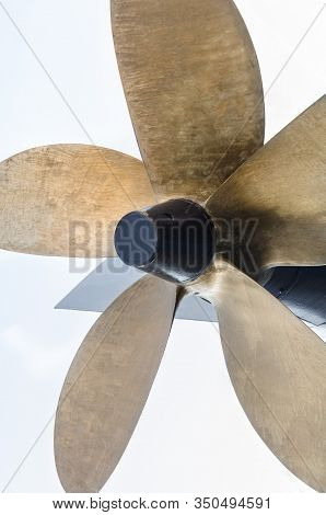 Large Metal Ship Screw On A Light Background