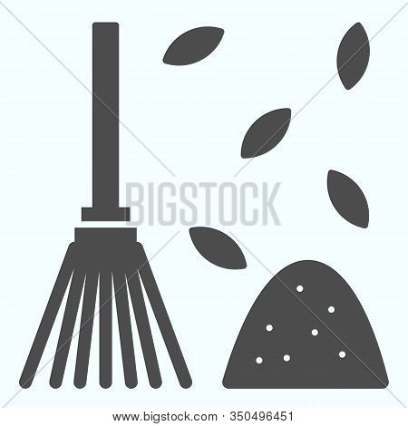 Raking Fallen Leafs Solid Icon. Gardening Tool For Rake Up Leaves. Autumn Season Vector Design Conce