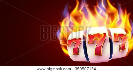 Burning Slot Machine Wins Wins The Jackpot. Fire Casino Concept. Hot 777