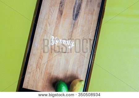 Los Angeles, California, Usa - 12 February 2020: Yummly App Icon On Phone Screen Top View, Illustrat