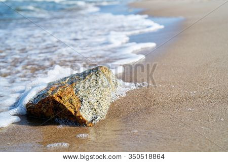 Stone On The Shore Of The Baltic Sea Near Rewal In Poland