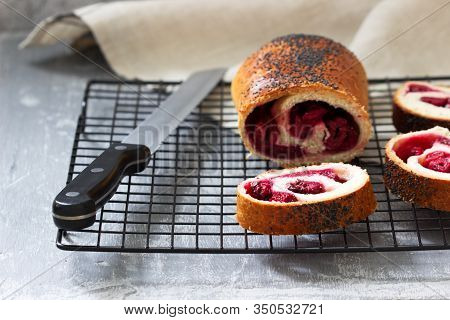 Traditional Moldovan Or Romanian Cake From Yeast Dough With Cherries.