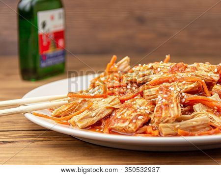 Spicy Chinese Or Korean Yuba Tofu Bamboo And Carrots Salad On Wooden Background
