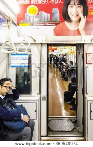 Tokyo, Japan - 12 November, 2019, People Traveling  In Tokyo Subway Car  In Tokyo City, Japan At Nov