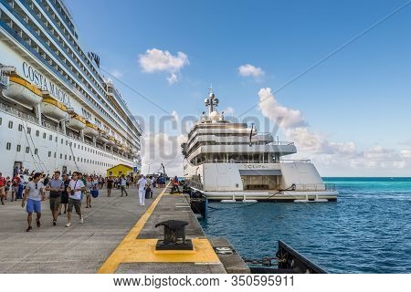 Philipsburg, St. Maarten - December 17, 2018: Cruise Ship Costa Magica And Luxury Motor Superyacht E
