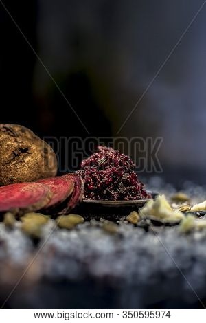 Close Up Of Fresh Beetroot Halwa Or Beet Ka Halwa In A Plate With Some Spread Sugar Crystals And Ela