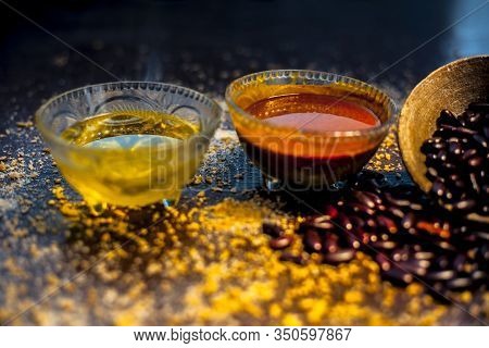 Home Pore Remedy On The Black Glossy Surface Consisting Of Some Red Beans Or Kidney Beans Mung Beans