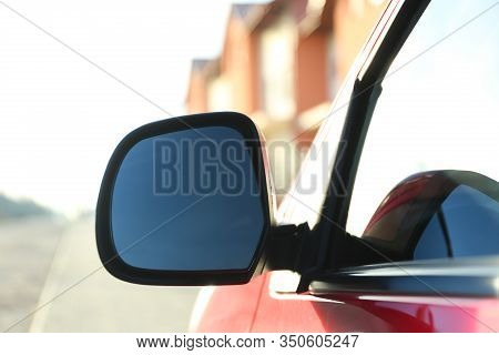 Side Rear View Mirror Of Modern Car Outdoors