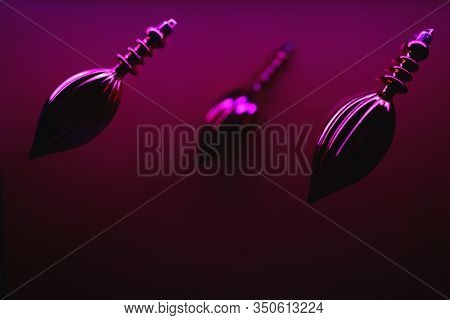 Butt Plug On Neon Background. Sex Toys For Ass. Abstract Light Blue And Pink Neon Background Texture