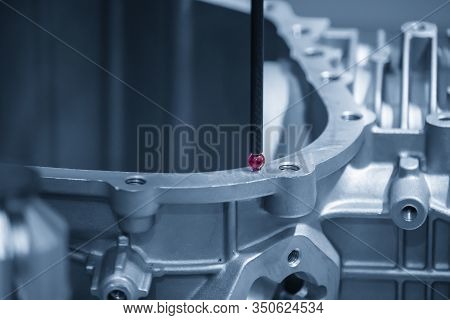 Close Up Scene Touching Probe Measuring Dimension Of The Casting Gear Box Housing . The Quality Cont