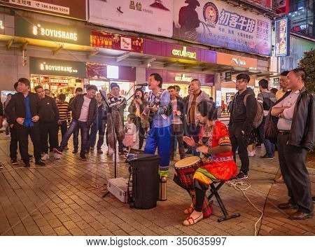 Changsha/china-17 October 2018:unacquainted Street Performers Singing And Wearing Traditional Tribe 