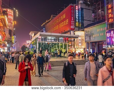 Changsha/china-17 October 2018:unacquainted People Walking On Huangxing Walking Street In Changsha C