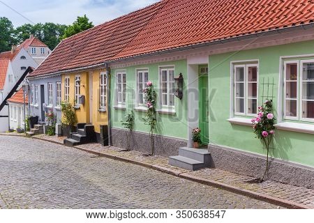 Colorful Historic Houses In A Cobblestoned Street Of Haderslev, Denmark