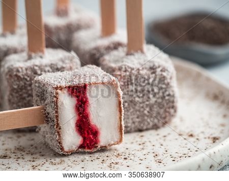 Homemade Raw Lamington Ice Cream Pops On Light Background. Australian Sweet Dessert Lamington With C