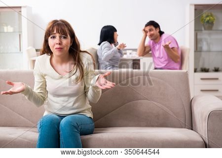 Young family and mother-in-law in family issues concept