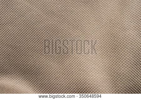 Durable Waterproof Fabric. Ripstop Fabric. Close-up Brown Ripstop Material Texture And Background.