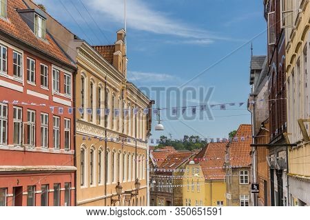 Haderslev, Denmark - June 26, 2019: Old Buildings And Flags In The Historic Center Of Haderslev, Den