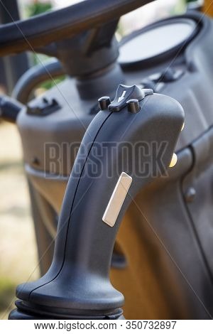 Operating Control Panel And Steering Wheel In Agricultural Or Industrial Machine. Detail Of Vehicle