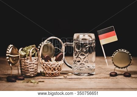 Crown Cork Miniature Figures With Barley, Hop Cones, Beer Glass And A German Flag, Humorous Conceptu