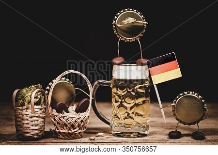 Crown Cork Miniature Figures With Barley, Hop Cones, Beer Glass And A German Flag, Humorous Conceptu