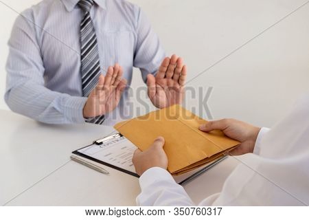 The Businessman Denies The Money In Envelope Proposed By His Partner To Bribe The Concept Of Bribery