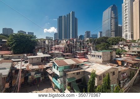 Metro Manila, Philippines - February, 12, 2020: Cityscape Of Makati And Bgc: Slums And Skyscrapers C
