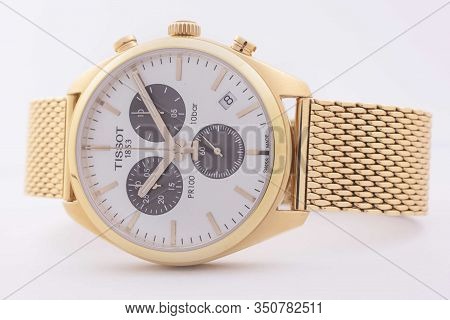 Le Locle, Switzerland 15.01.2020 - Tissot Woman Watch Stainless Steel Case, Gold Pvd Coating White C