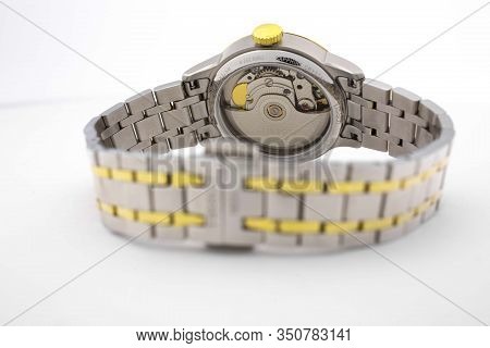 Le Locle, Switzerland 15.01.2020 - Tissot Woman Watch Stainless Steel Case, Gold Pvd Coating Metal B