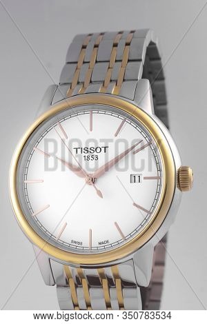 Le Locle, Switzerland 15.01.2020 - Tissot Woman Watch Stainless Steel Case, Gold Pvd Coating White C