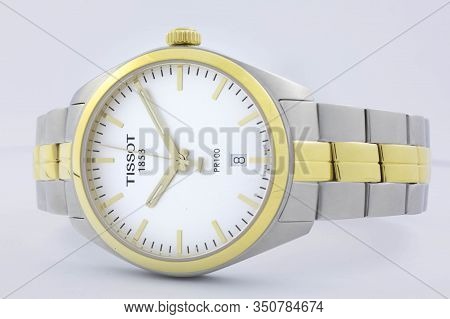 Le Locle, Switzerland 15.01.2020 - Tissot Woman Watch Stainless Steel Case, Gold Pvd Coating White C