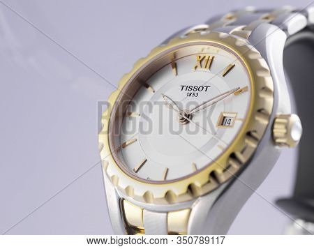 Le Locle, Switzerland 15.01.2020 - Tissot Woman Watch Stainless Steel Case, Gold Pvd Coating White C