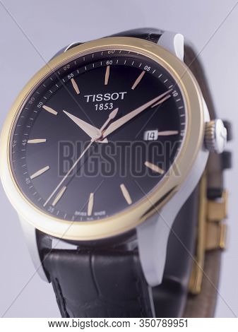 Le Locle, Switzerland 15.01.2020 - Tissot Man Watch Stainless Steel Case, Gold Pvd Coating Black Clo