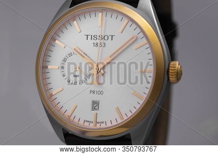 Le Locle, Switzerland 15.01.2020 - Tissot Man Watch Stainless Steel Case, Gold Pvd Coating White Clo