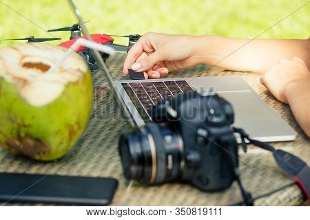 Young Photographer Woman Feeling Happy Becouse She Get Money Online While Sitting At Tropical Cafe