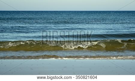 Sunny Day At The Beach In Winter.