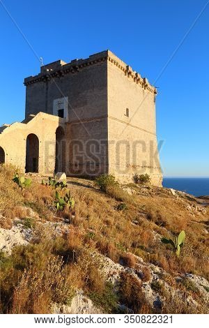 Apulia Sunset View - Porto Selvaggio Defensive Tower Landmark. Italy Coast.